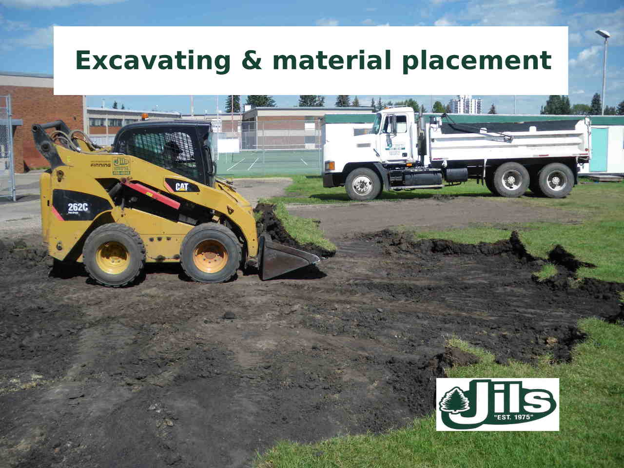 Bobcat digging yard
